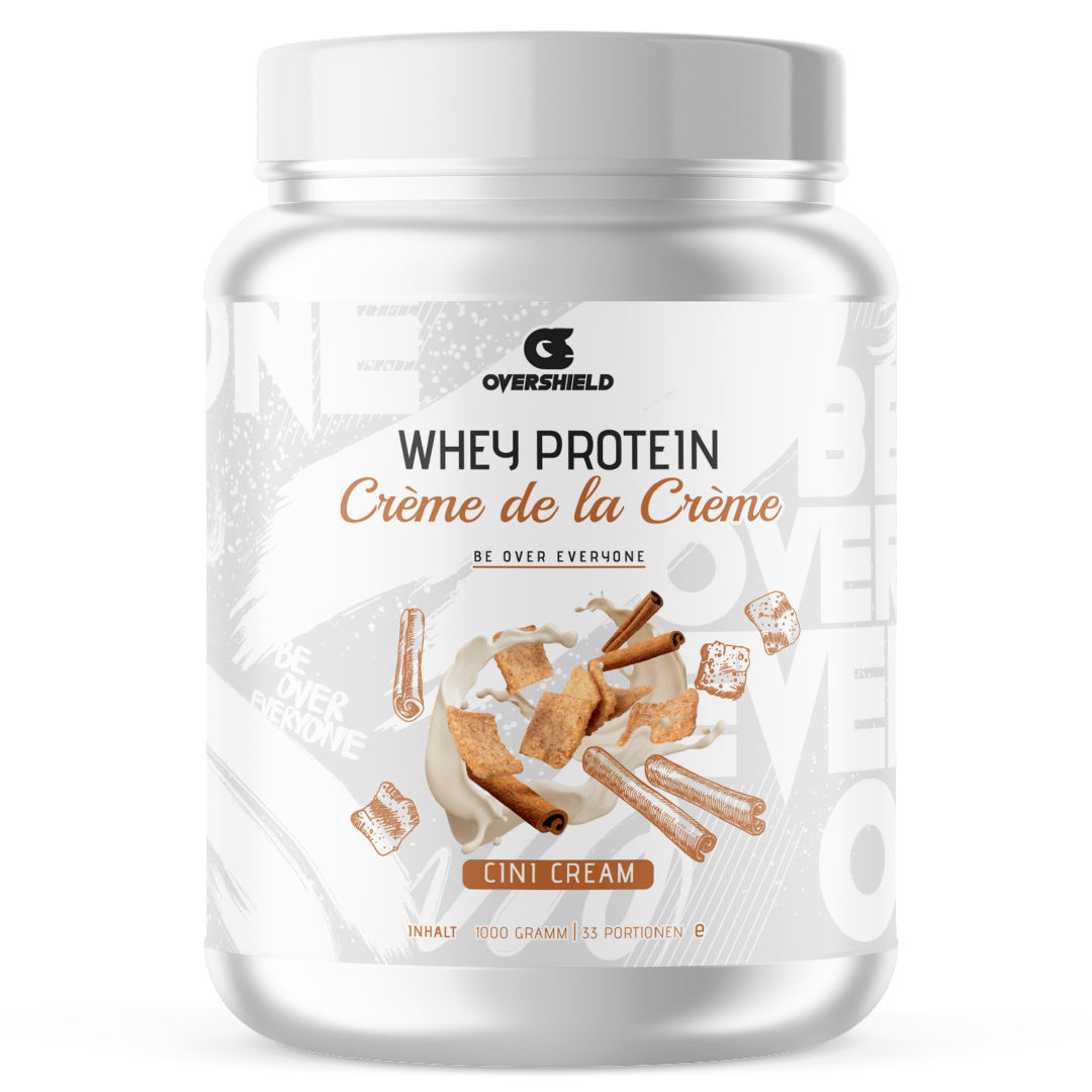 Cini Cream Whey Protein in einer weißer Dose mit dem Schriftzug Crème de la Créme. Der Inhalt entspricht 33 Portionen.